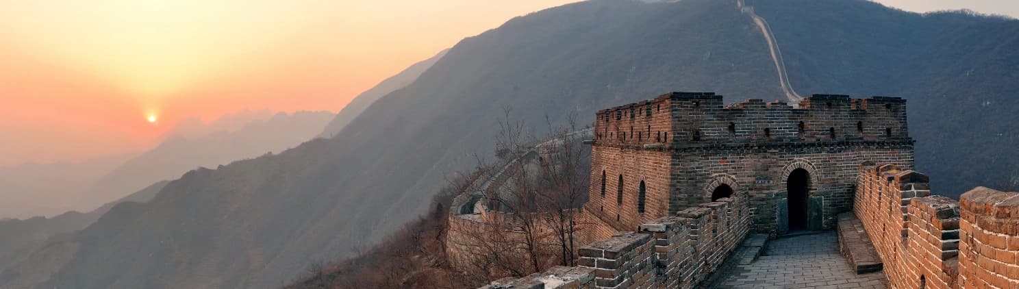Iconic China travel experiences featuring the Great Wall, modern skyline, and cultural landmarks showcasing unique tourism attractions