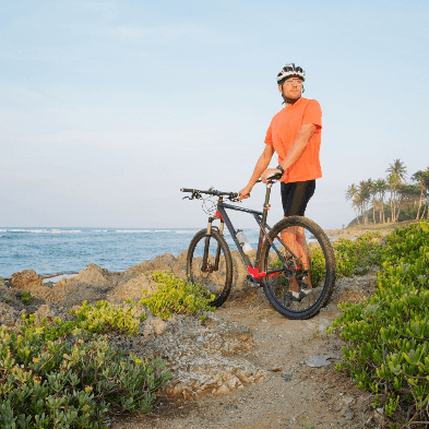 Mountain bikers riding coastal trails between Mirissa and Unawatuna Sri Lanka