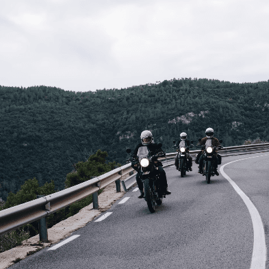 Motorbike riders on the winding mountain passes of the Hà Giang Loop Vietnam