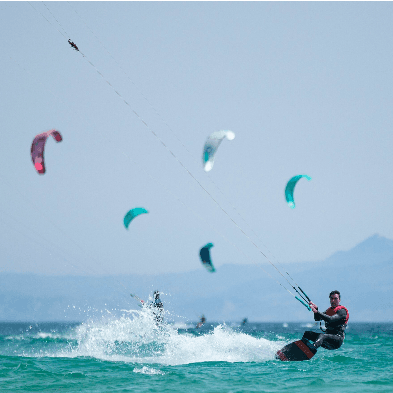 Kitesurfer riding coastal winds and waves at Mũi Né Vietnam