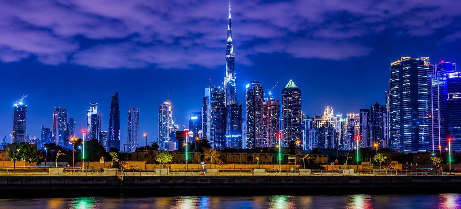 Breakdown of flight, hotel, and land package costs for a Dubai trip from India