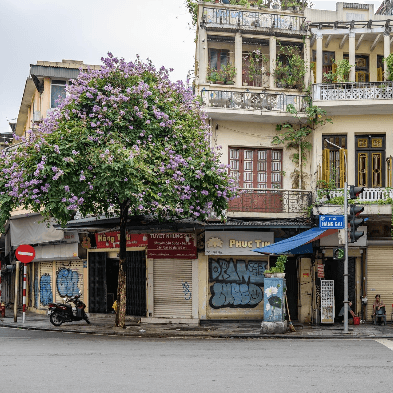 Hanoi Old Quarter with busy streets, local shops, and vibrant city life